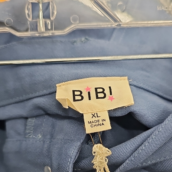 BiBi Blue Boot-Cut Pants with Multicolor Flower Motifs - Picture 5 of 12